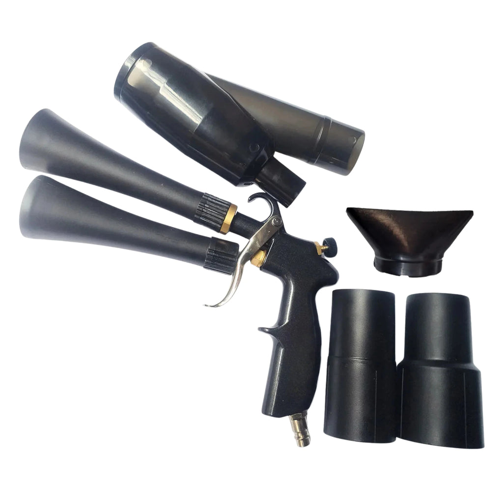 2-in-1 air blow and vacuum detailing gun with nozzle and brush attachments on a white background