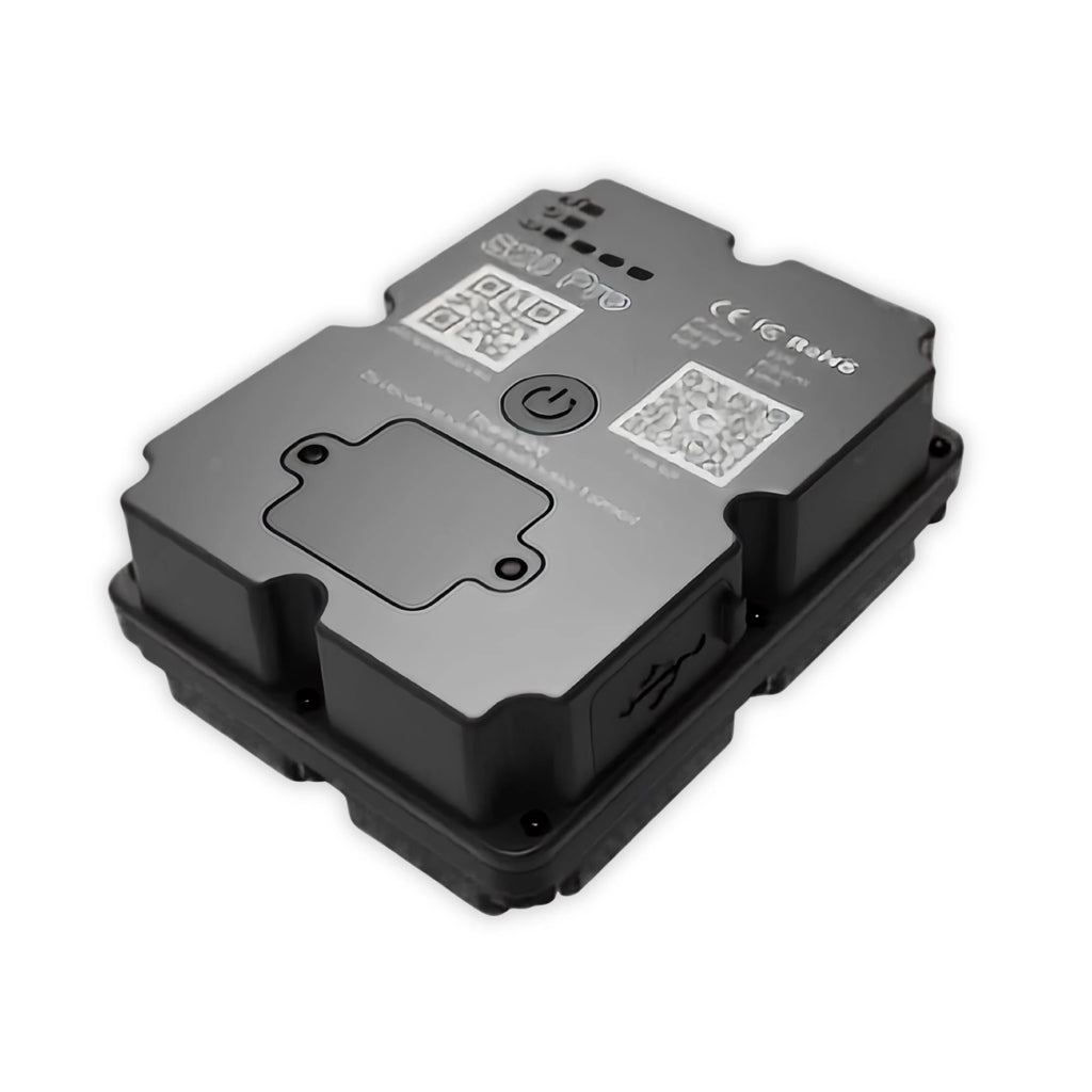 A black rectangular electronic control module with a matte finish, featuring printed technical specifications, QR codes, and a power symbol on top, shown on a plain white background.