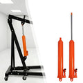 Orange 8-Tonne Long Ram Jack shown retracted and extended beside a black workshop engine crane