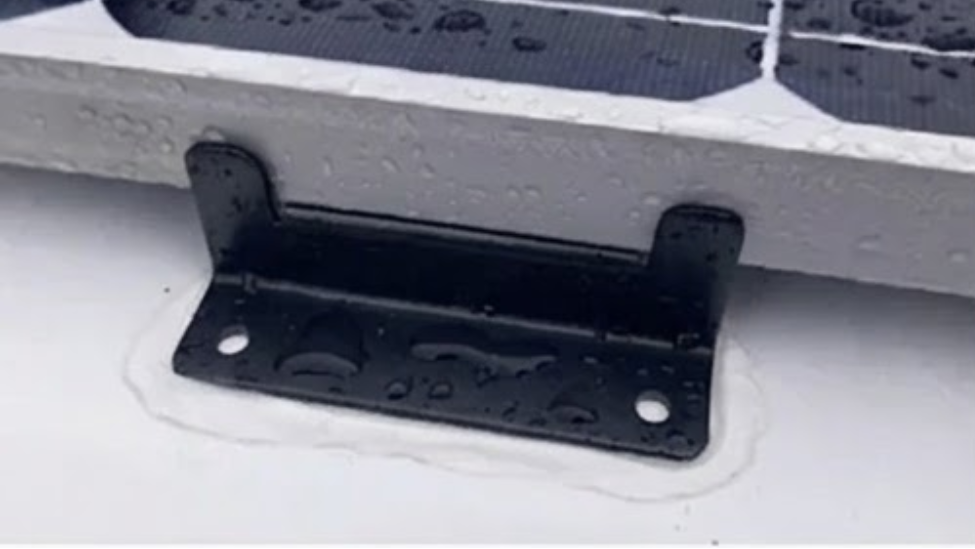 Black metal mounting brackets and screws shown on a white background, with two inset photos at the bottom demonstrating the brackets attached to a solar panel.