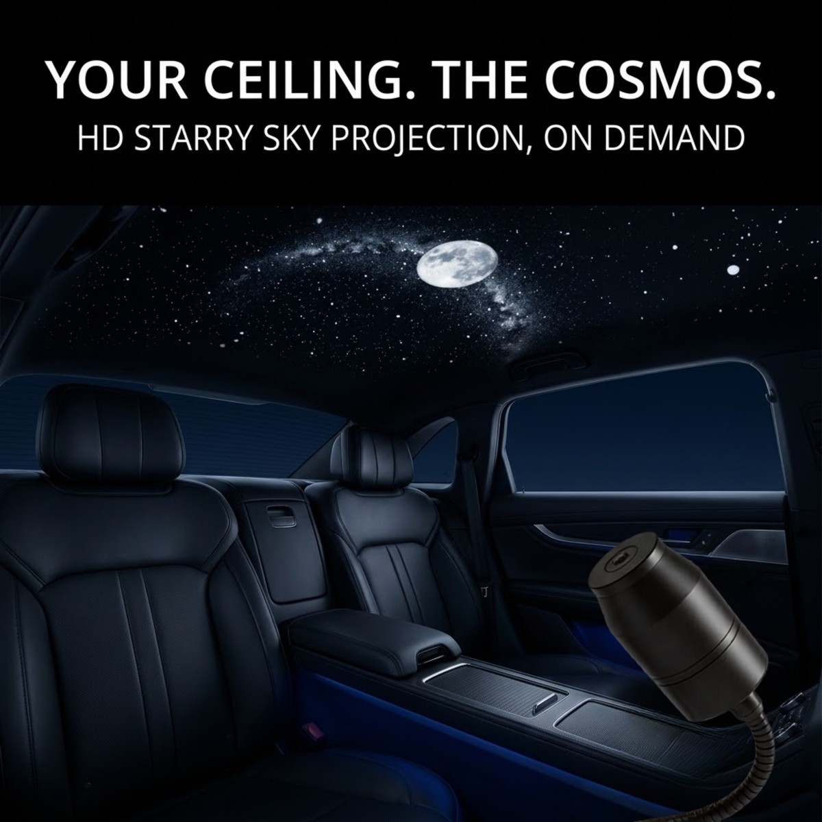 A car interior with a starry sky projection on the ceiling, showing a galaxy and moon, with a black cylindrical projection device on a cord in the lower right. Text at the top reads: 'YOUR CEILING.