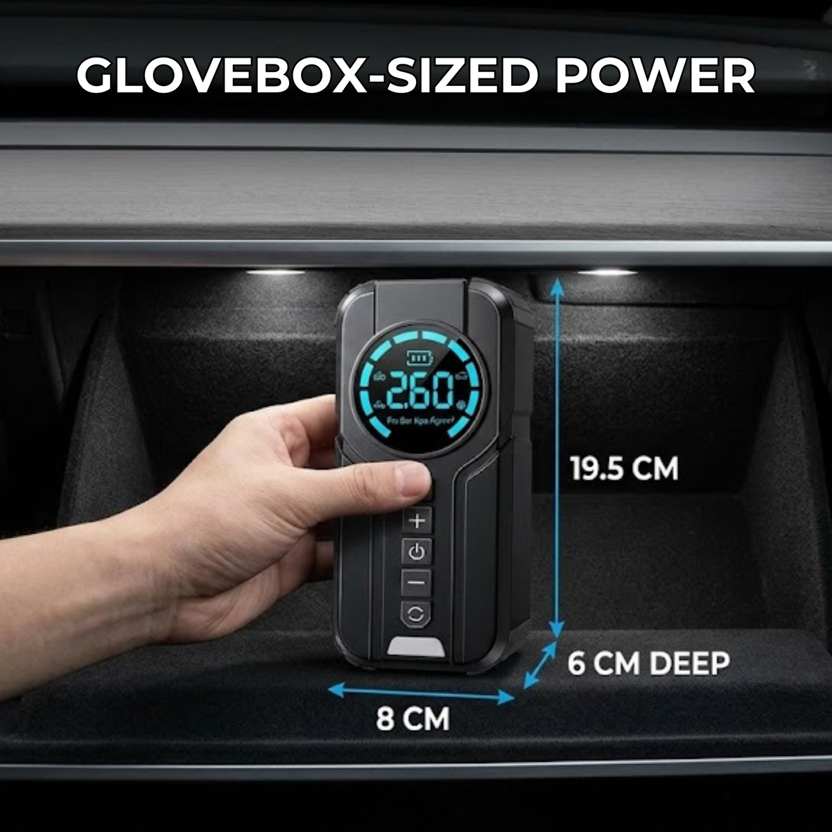 Hand placing the Compact Jump Starter Kit in a car glovebox, with dimensions of 19.5 cm high, 8 cm wide and 6 cm deep