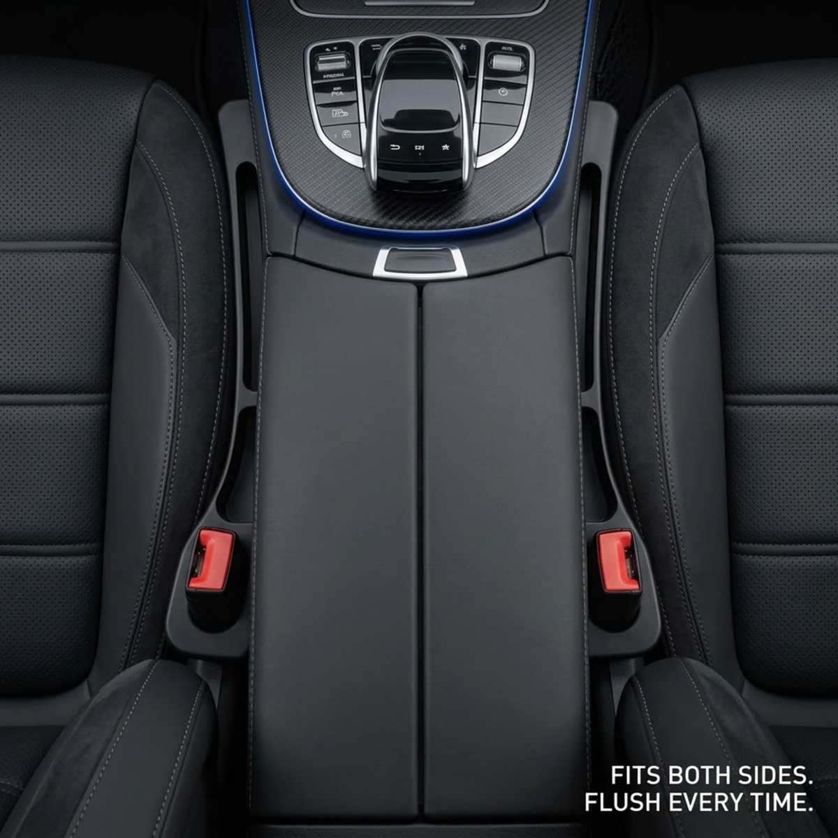 Black car interior center console armrest cover installed between two black leather seats, with the gear shift console visible above and a small text note in the bottom right reading 'FITS BOTH SIDES. FLUSH EVERY TIME.