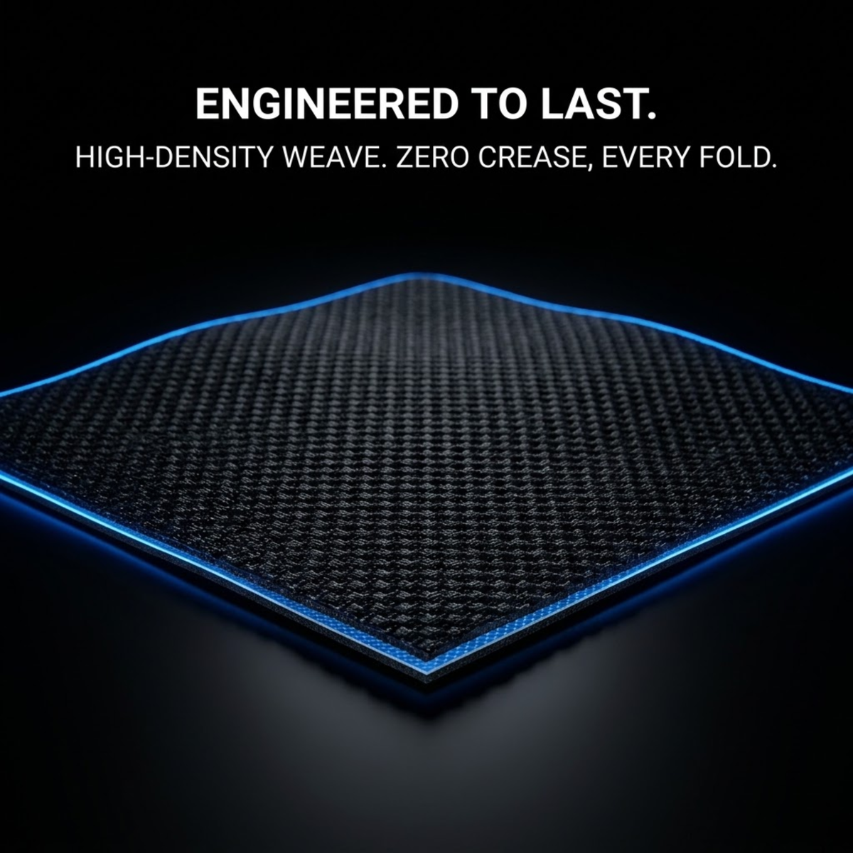 A close-up of a dark textured mat or pad with a blue illuminated edge, shown on a black background with the text 'ENGINEERED TO LAST. HIGH-DENSITY WEAVE.