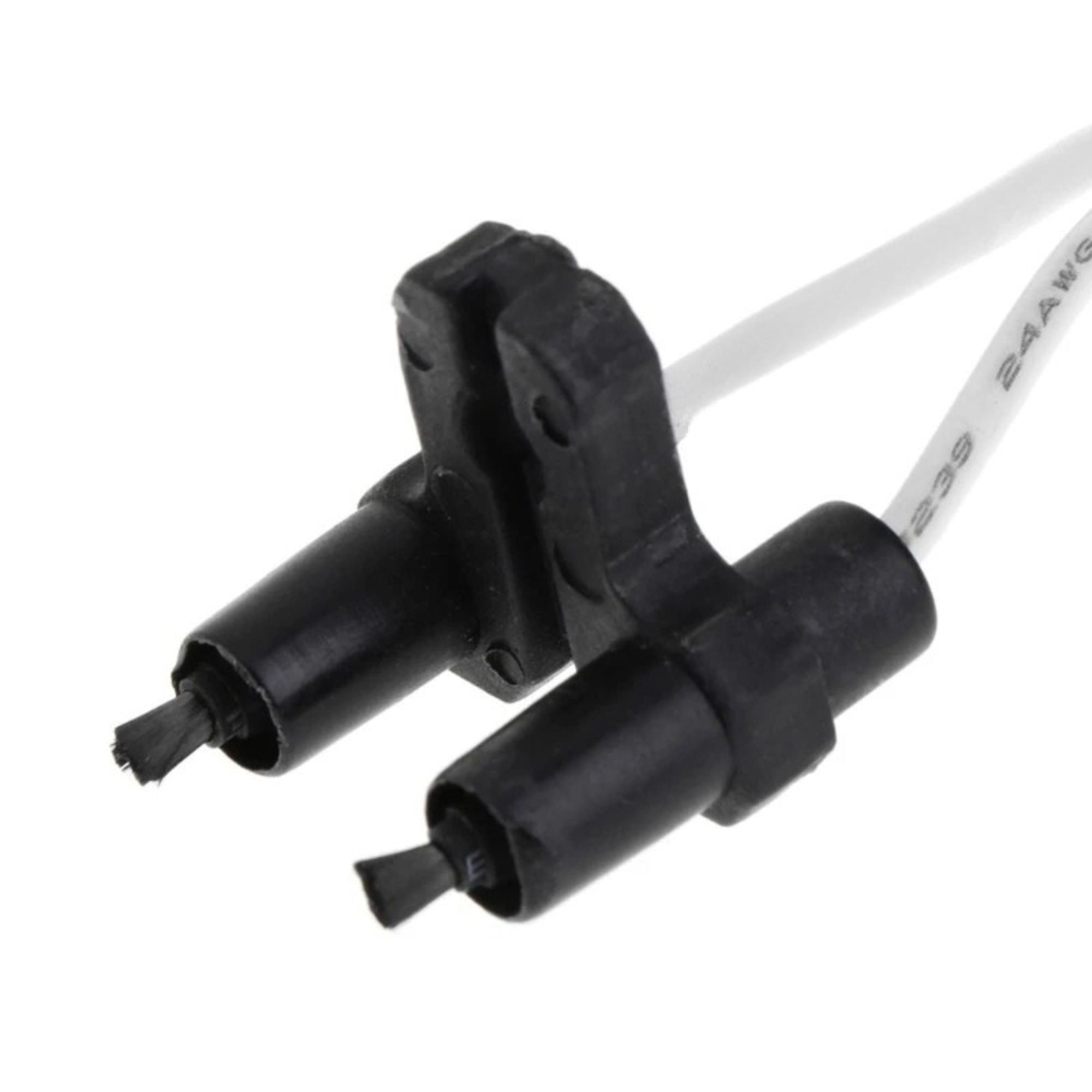 Close-up of the twin ceramic ionizer output terminals with white wiring on the compact car air ionizer module