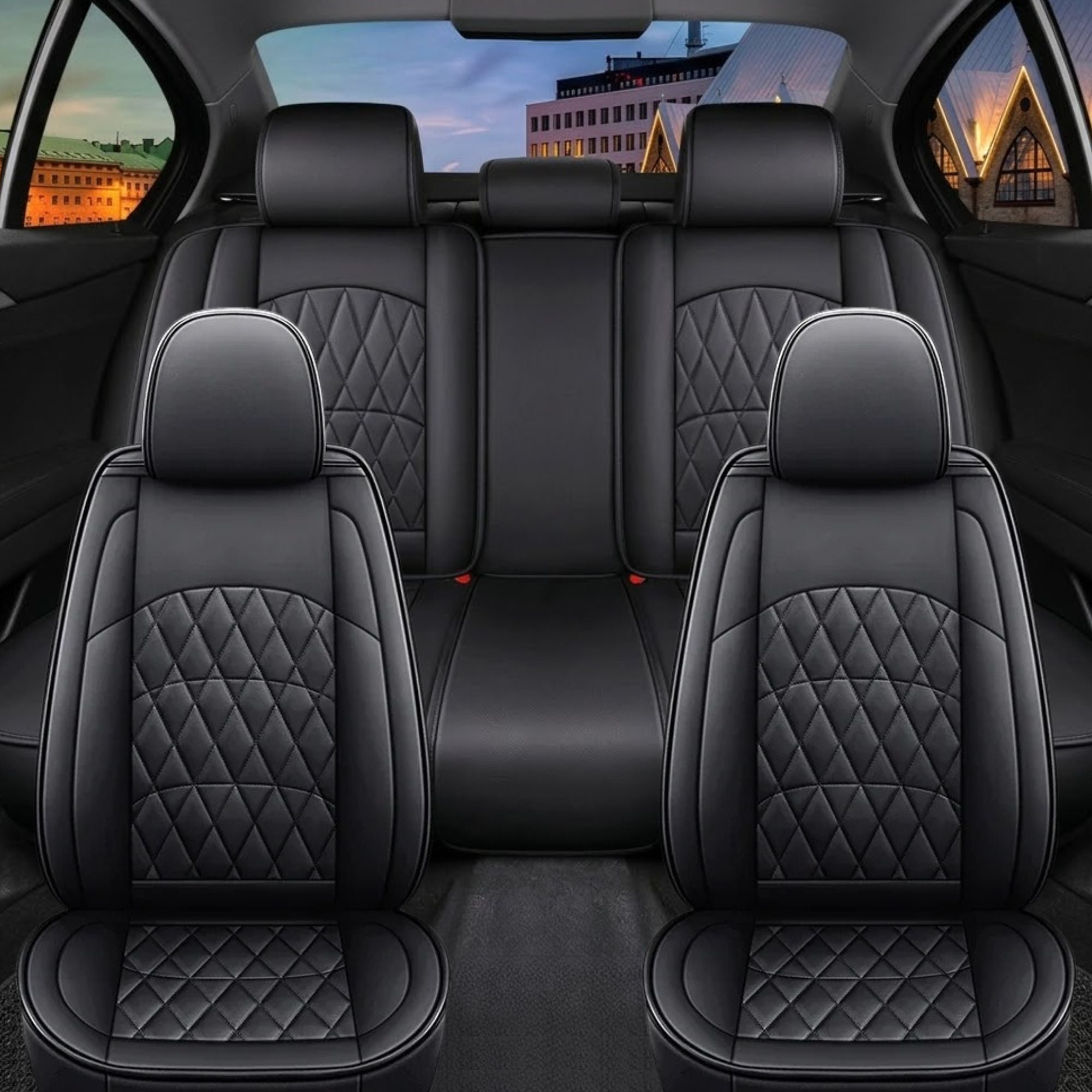 Full Coverage PU Leather Car Seat Covers installed in a vehicle interior at sunset