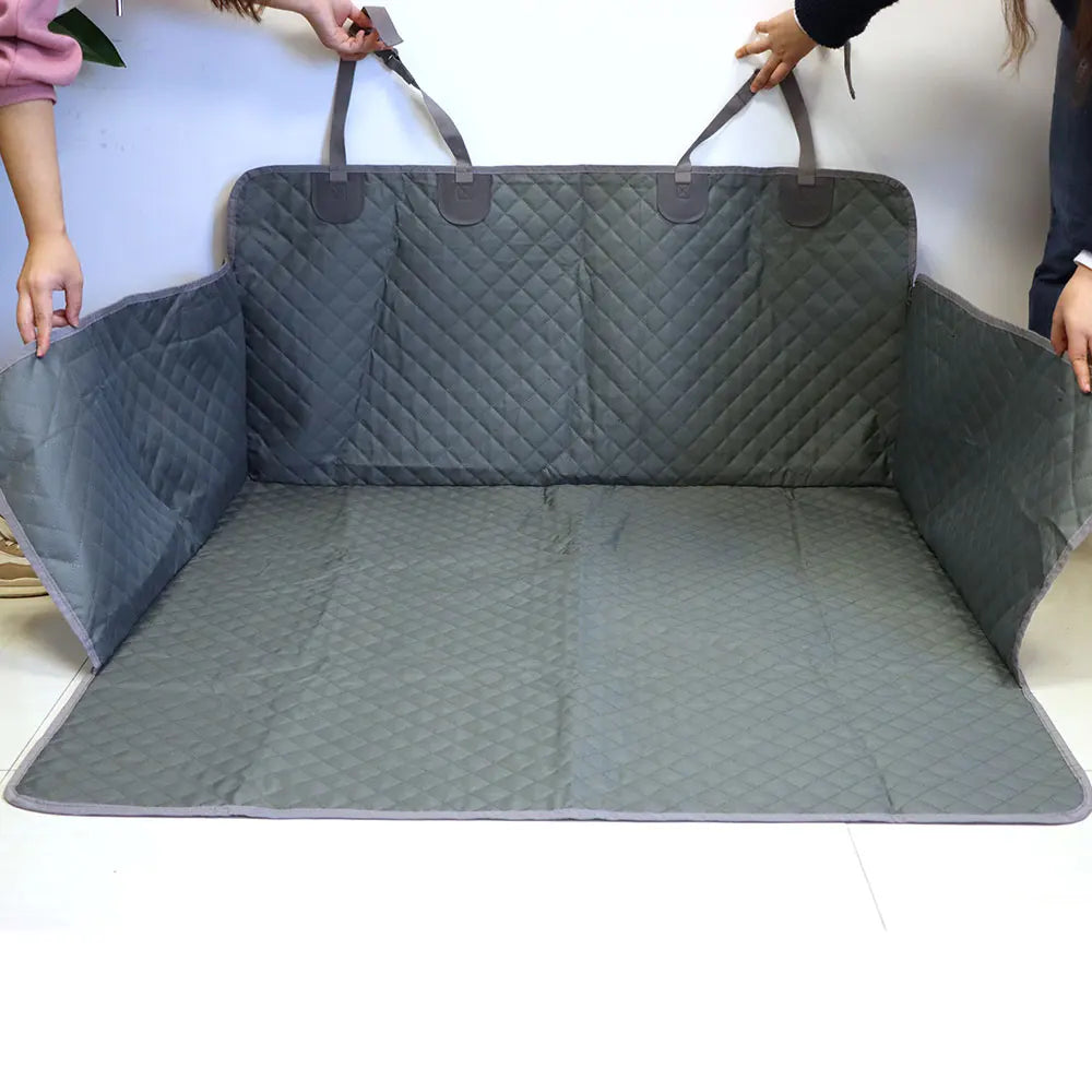 Waterproof Dog Boot Liner in grey colourway held open to show the full cargo cover shape