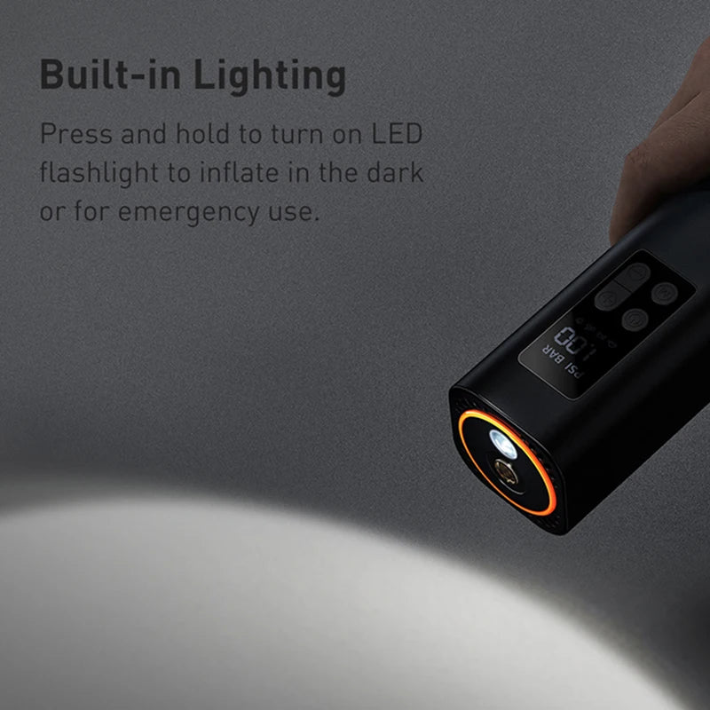 Black inflatable device with LED flashlight on a gray background