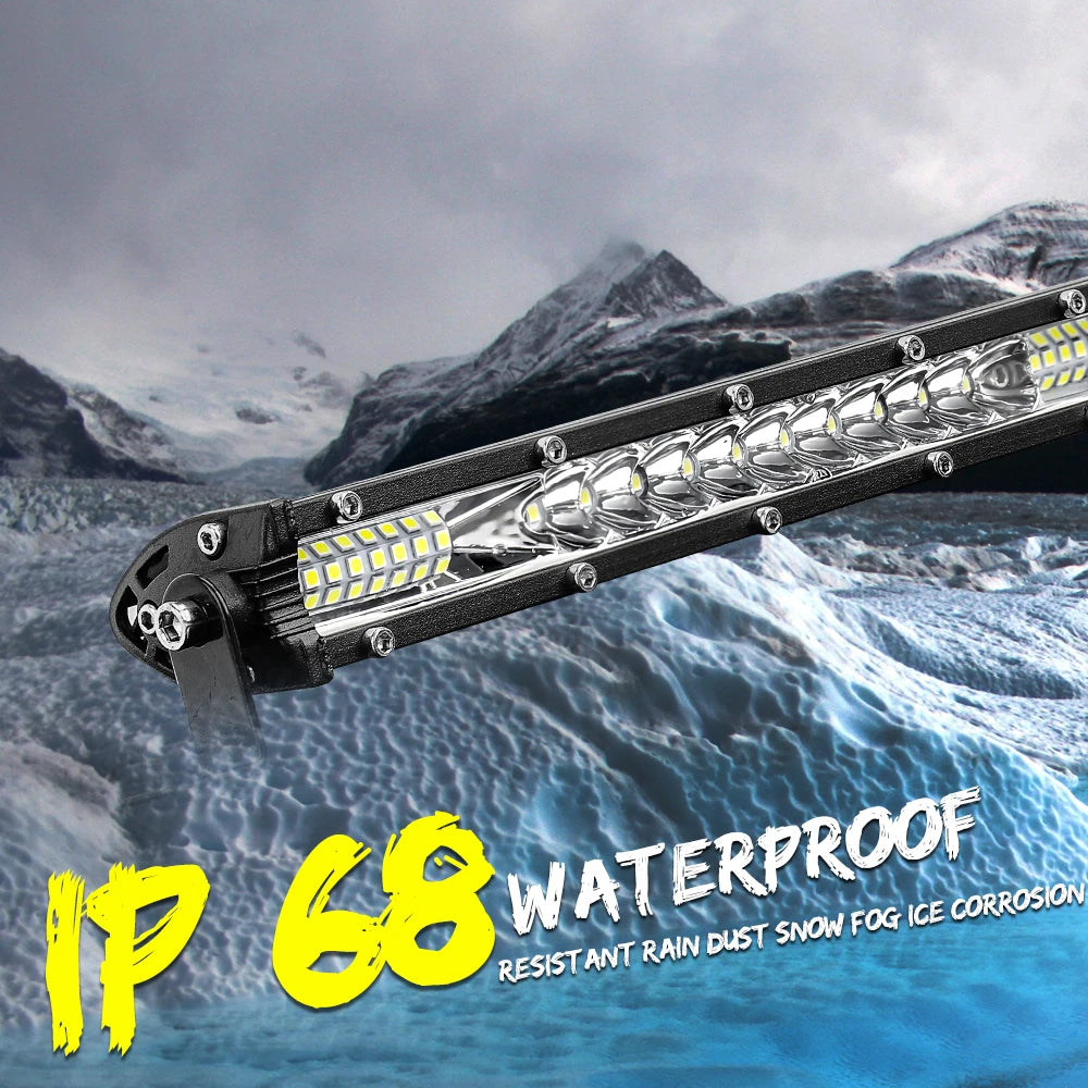 LED light bar mounted on vehicle shining across rocky mountain terrain, IP68 waterproof rated