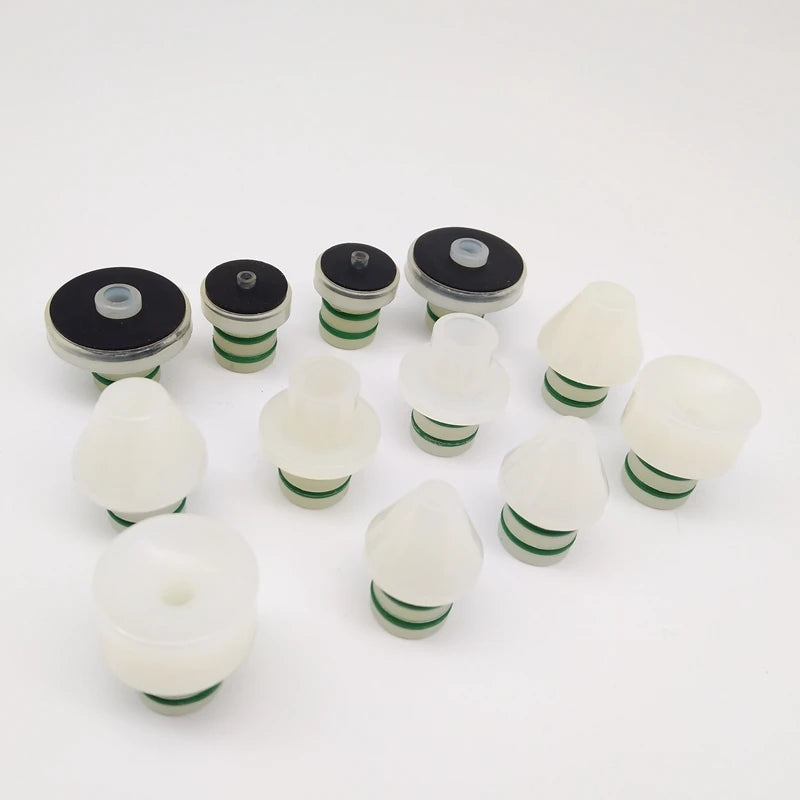 A/C Leak Test Plug Kit white nylon sealing plugs with green O-rings on a white background
