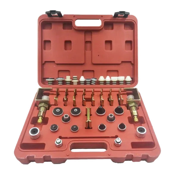 A/C Leak Test Plug Kit in a red carry case with assorted sealing plugs, adaptors and brass clamp fittings