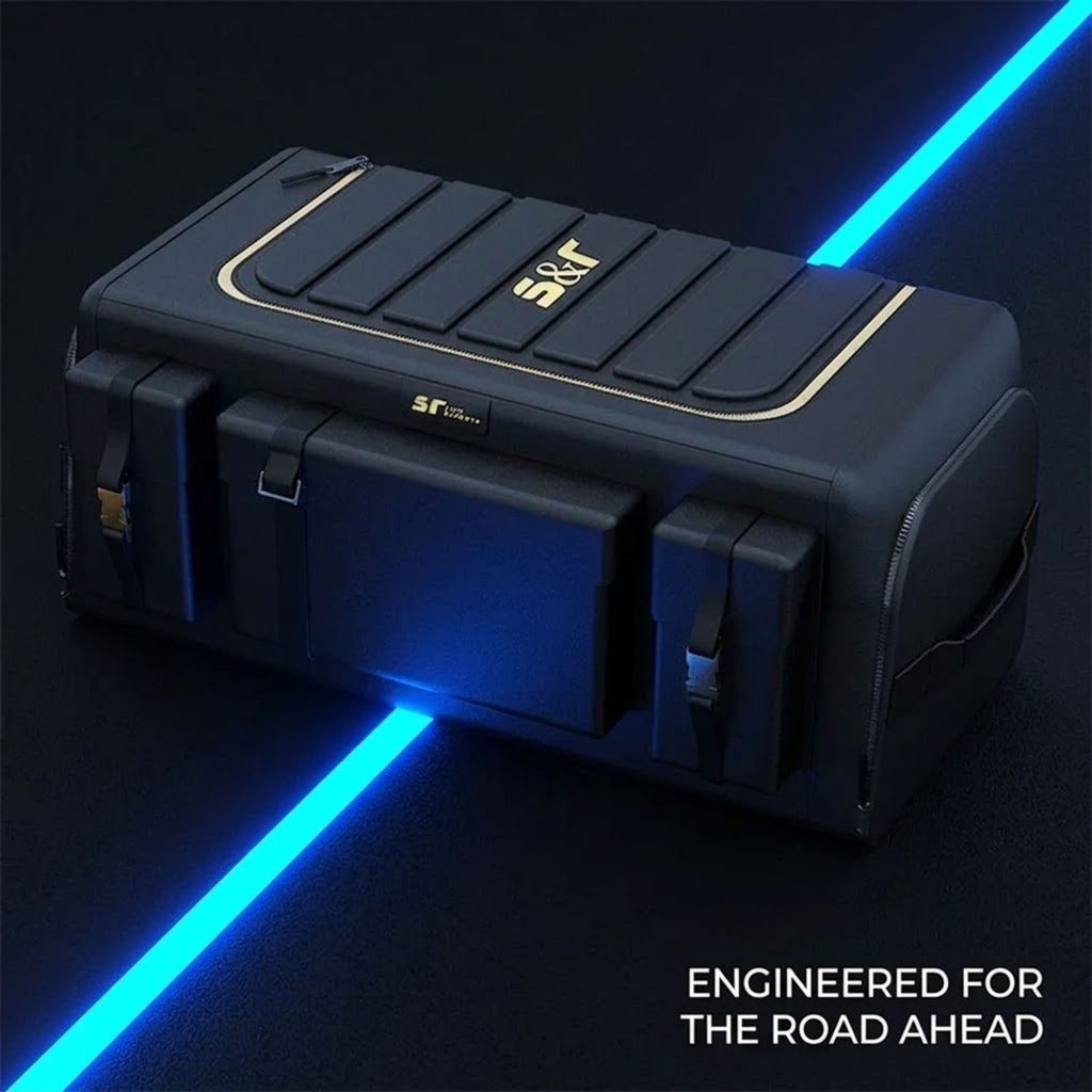 A rugged black technical case with gold accents and the brand name 'SF' on top, shown on a dark background with glowing blue light beams and the text 'ENGINEERED FOR THE ROAD AHEAD'.