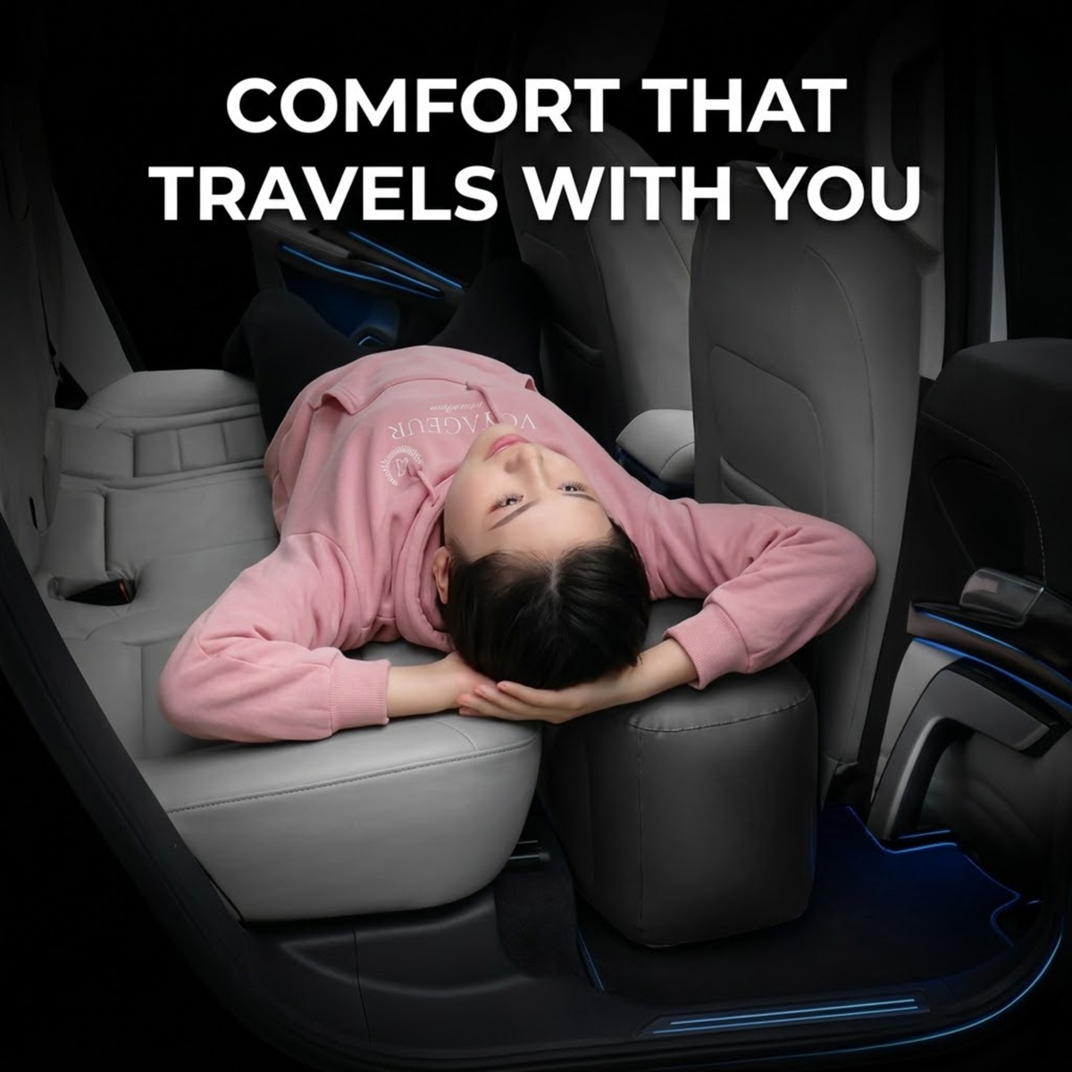 A child in a pink hoodie rests on a car seat cushion inside a vehicle, with large text reading 'COMFORT THAT TRAVELS WITH YOU' at the top. The scene demonstrates a car seat or interior comfort feature.