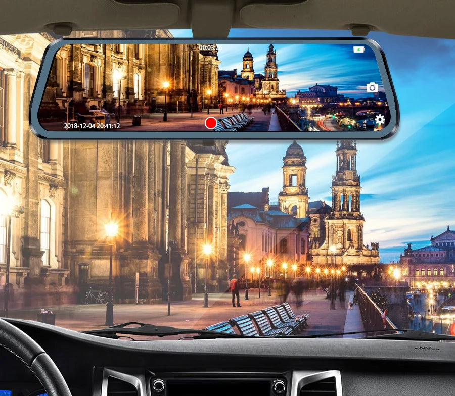 Streaming Mirror Dash Cam mounted on a car windscreen recording a golden hour street scene, viewed from the driver's seat