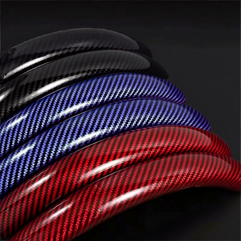 Close up of black blue and red Carbon Fibre Wheel Cover material texture