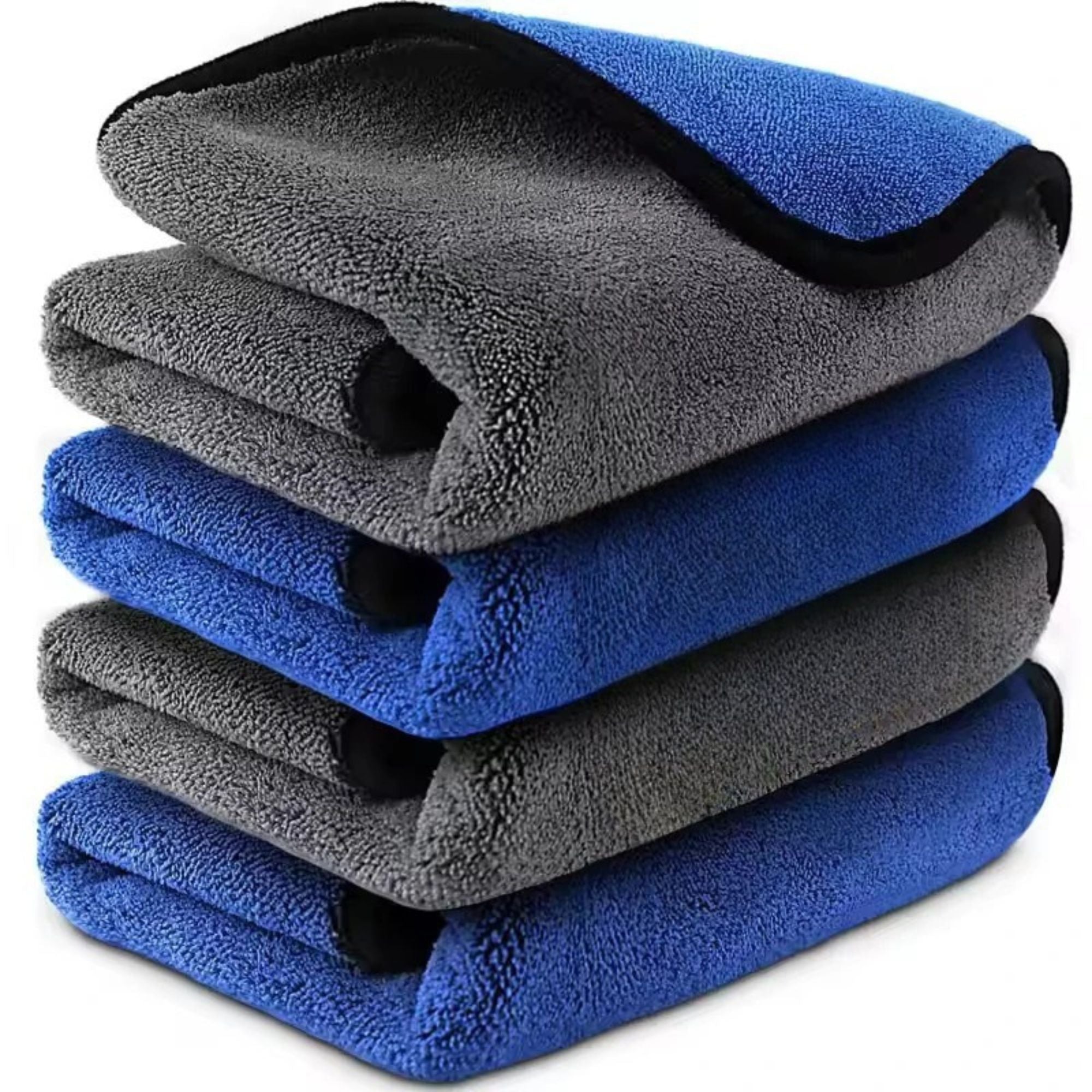 Folded stack of grey and blue microfibre car wash towels showing soft plush texture