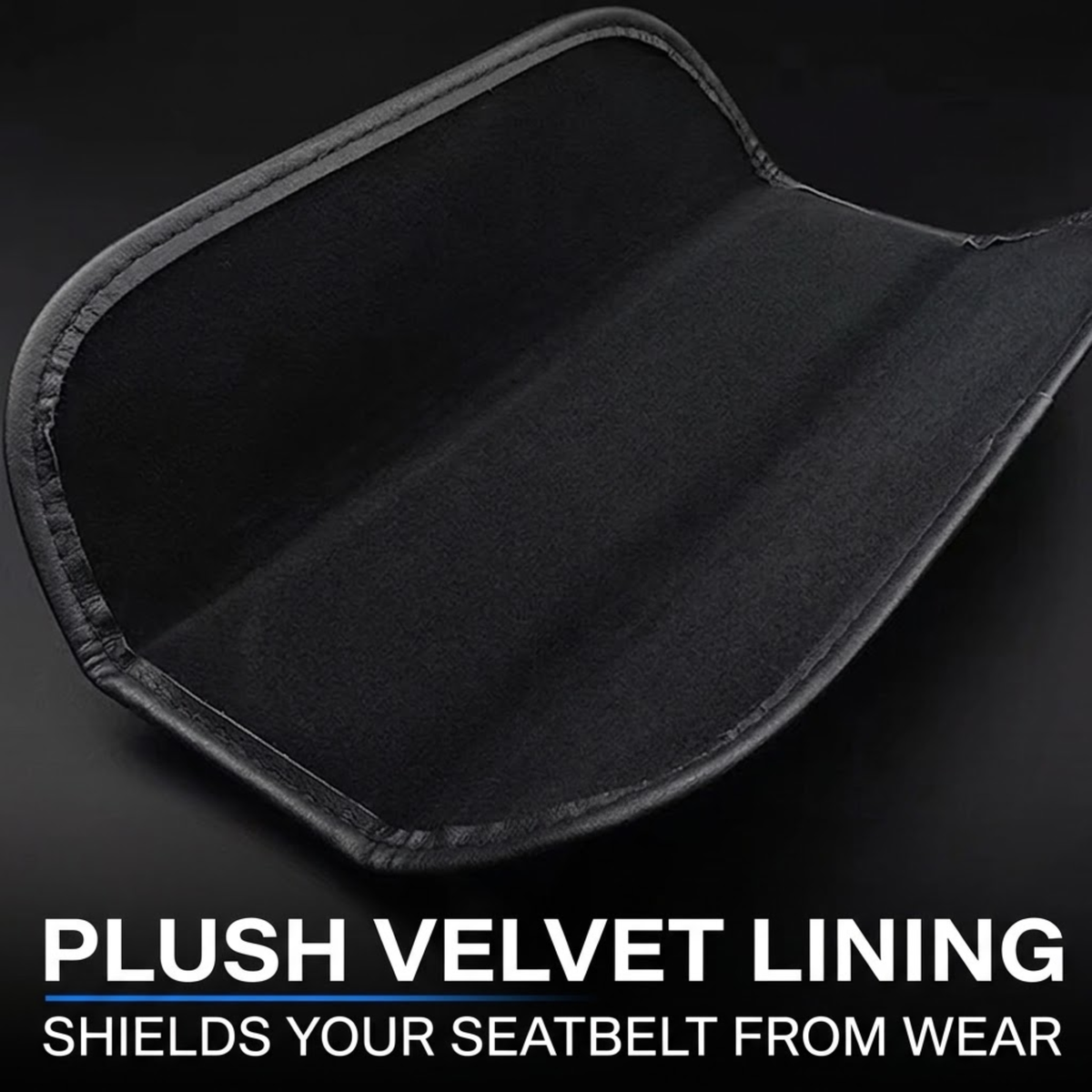 Black plush velvet seatbelt protector cover with stitched edges, shown on a dark background with text reading 'PLUSH VELVET LINING SHIELDS YOUR SEATBELT FROM WEAR'.