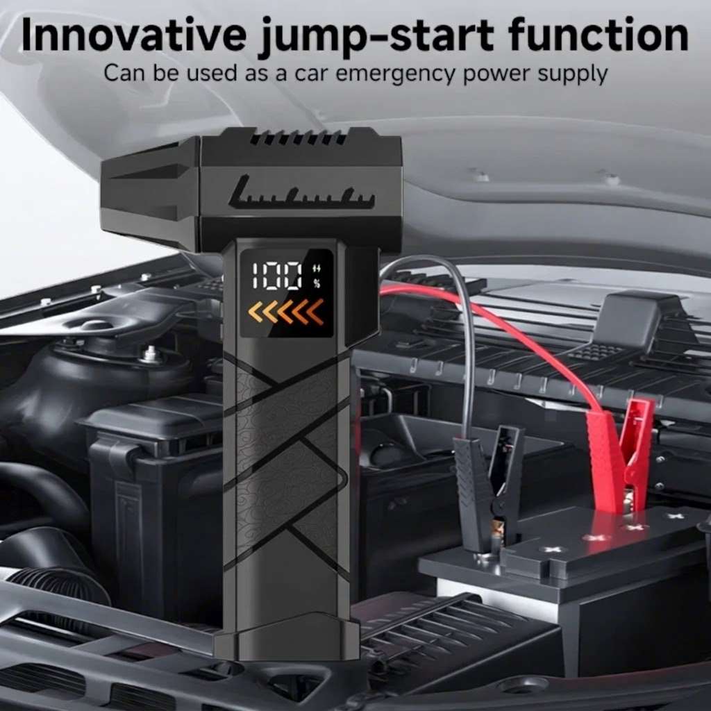 Turbo jet blower jump starter connected with jump leads to a car battery in an engine bay
