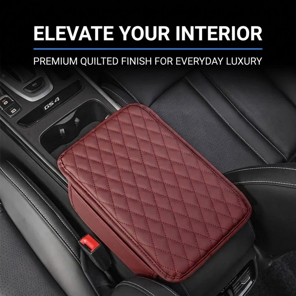 A quilted car center console organizer in burgundy red, shown installed on a black car seat next to the console. The image includes promotional text at the top reading 'ELEVATE YOUR INTERIOR' and 'PREMIUM QUILTED FINISH FOR EVERYDAY LUXURY'.