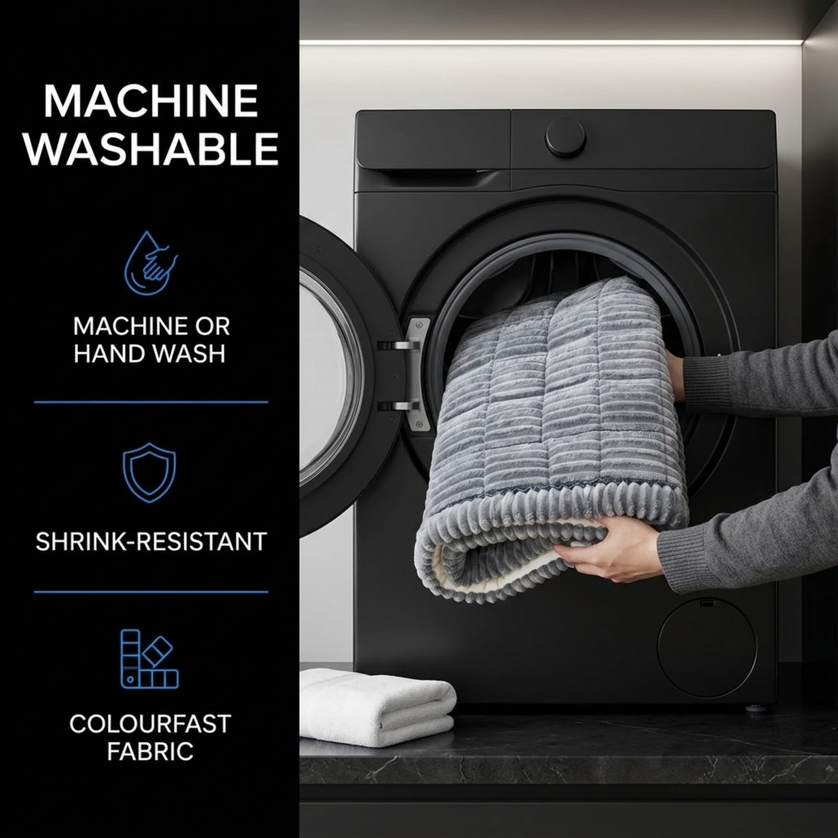 Rolled grey Plush Pet Car Cushion being placed into a front-loading washing machine, labelled machine washable