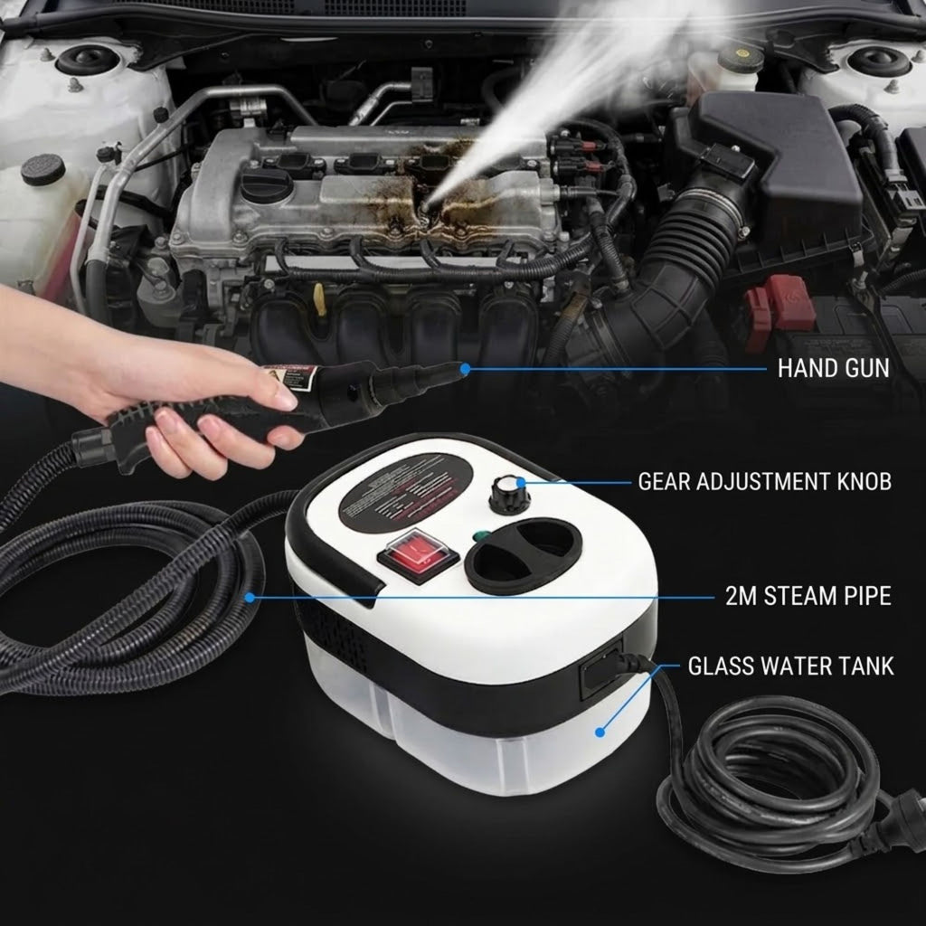 Steam engine cleaning kit shown with a hand holding the hand gun nozzle directing steam into an engine bay, with labeled callouts for hand gun, gear adjustment knob, 2m steam pipe, and glass water tank.