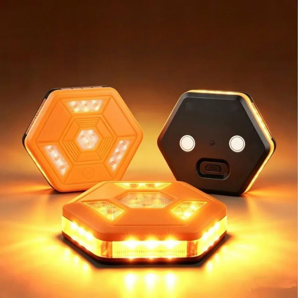 Three Rechargeable LED Road Flares shown lit and unlit against a dark background, highlighting the amber LED glow