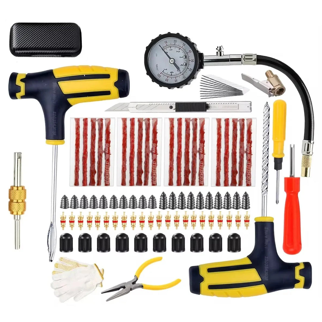 Heavy-duty tyre puncture repair kit laid out with a pressure gauge, T-handle insertion tools, rubber repair strips, valve cores, valve caps, pliers, work gloves and a carry case