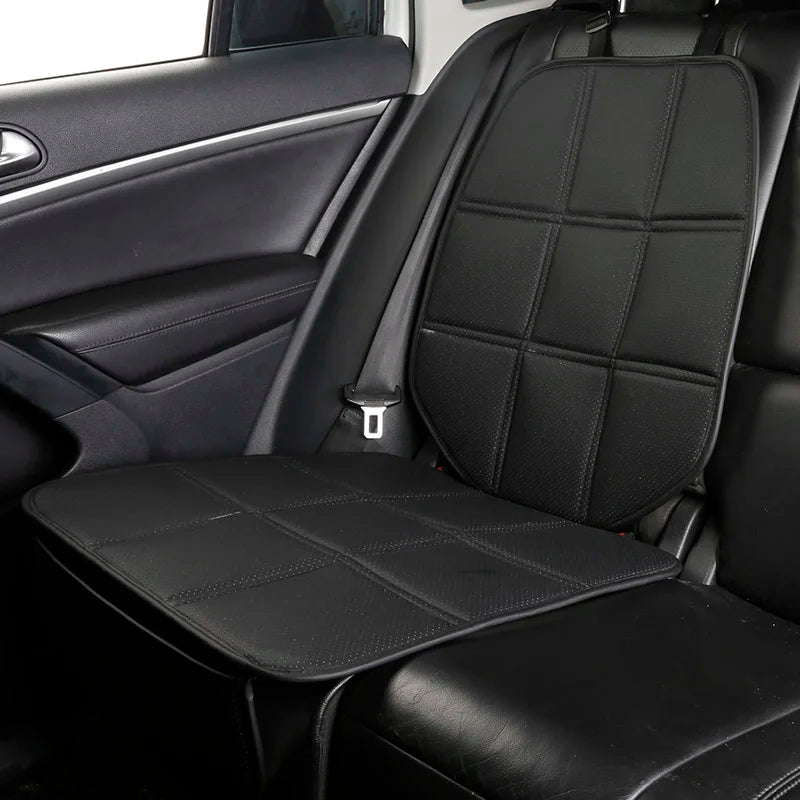 ISOFIX Child Seat Protector in black fitted beneath a child car seat on a vehicle's rear seat