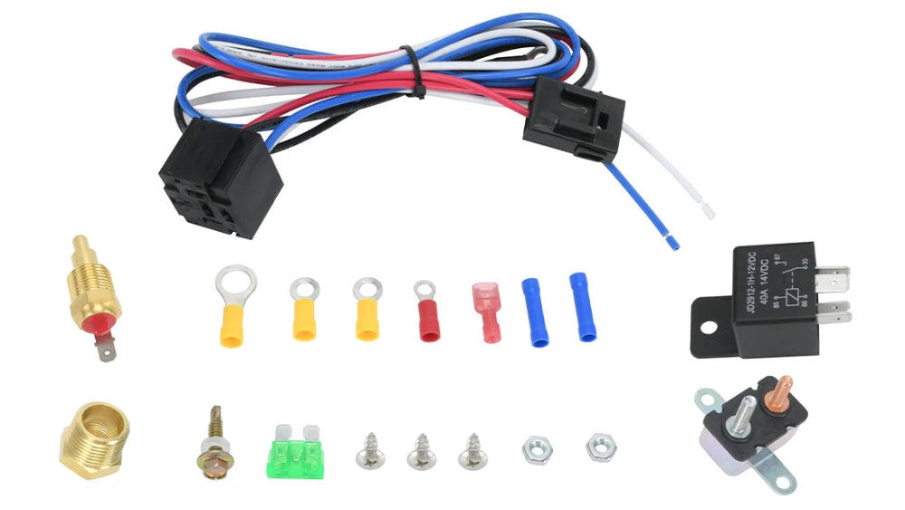 A 12V motorcycle or ATV wiring kit laid out on a white background, including a multi-colored wire harness, a black relay, a small switch, brass and copper fittings, ring splices, terminal pieces, screws, washers, and fuses.
