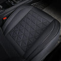 Front Seat Cushion Cover in black fitted to a car seat, close-up angled view