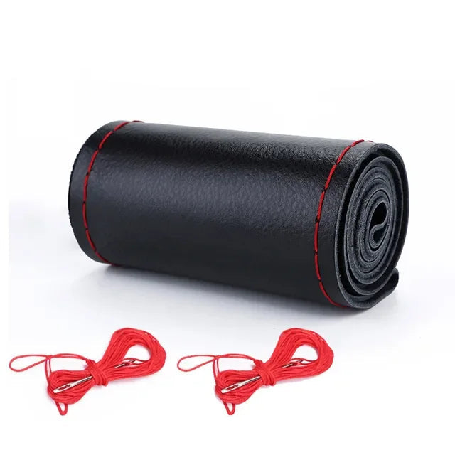 DIY Leather Steering Wheel Cover in black leather with red stitching, perforated design, with needle and thread