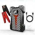 4-in-1 Roadside Power Pack with carbon-fibre pattern casing, digital charge display, red and black jump leads and USB-C charging cable