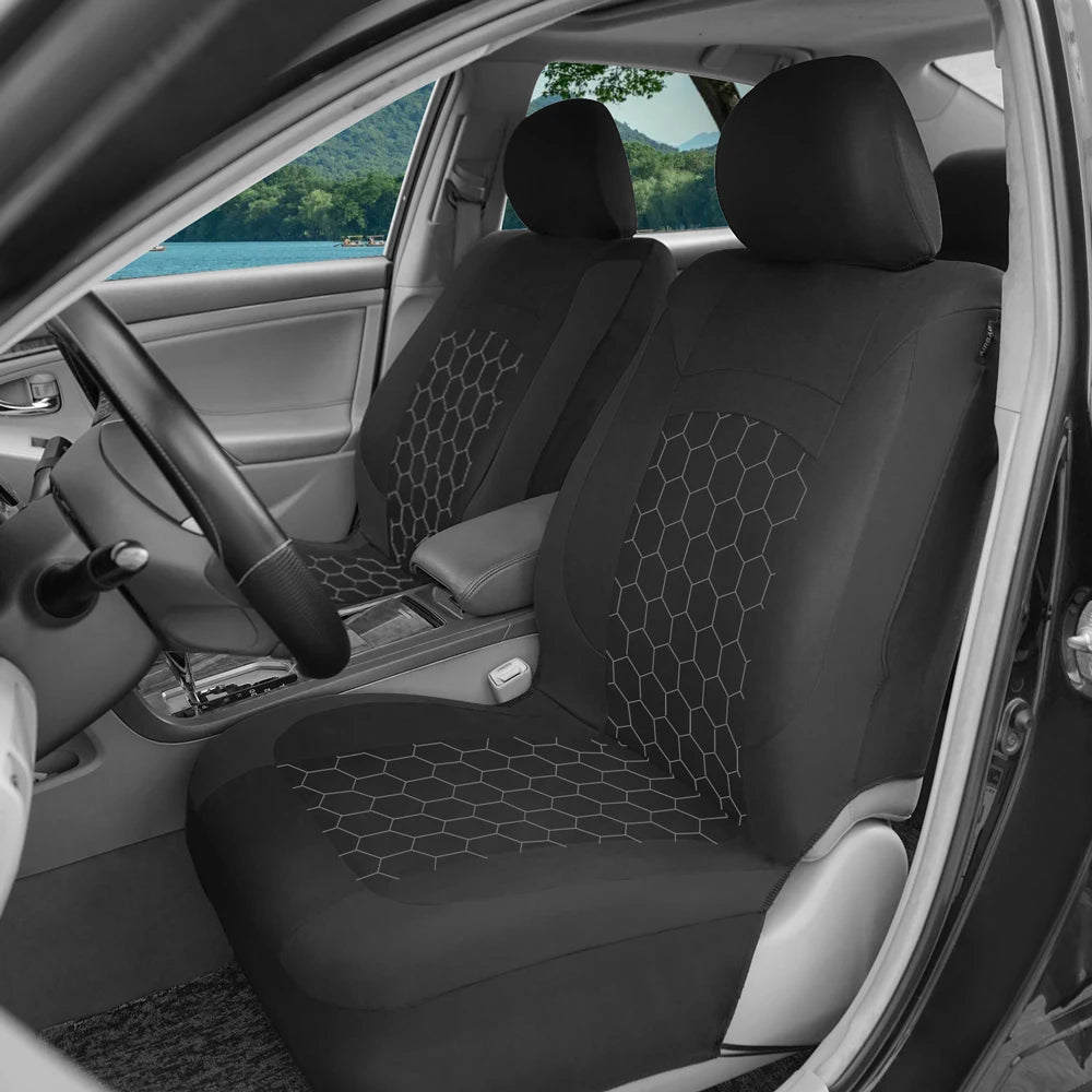 Black Football Embroidery Seat Covers fitted to a car's front seat