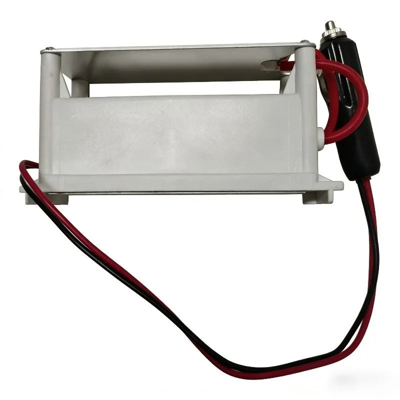 Compact 12V Ozone Generator side view showing white housing and 12V car plug power cable
