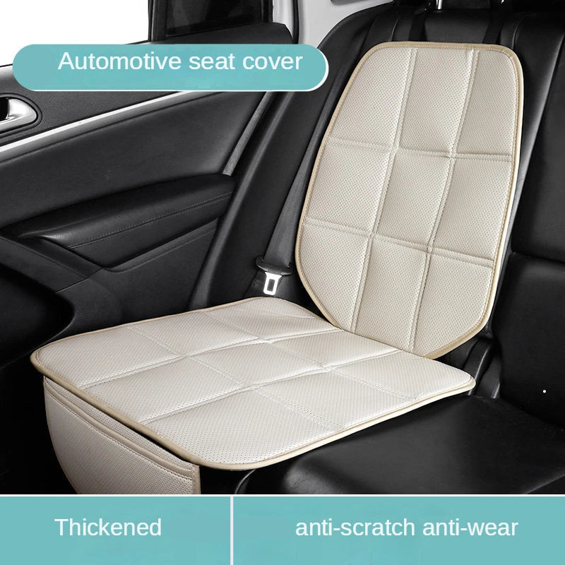 ISOFIX Child Seat Protector in cream leather fitted beneath a car seat, labelled as an automotive seat cover