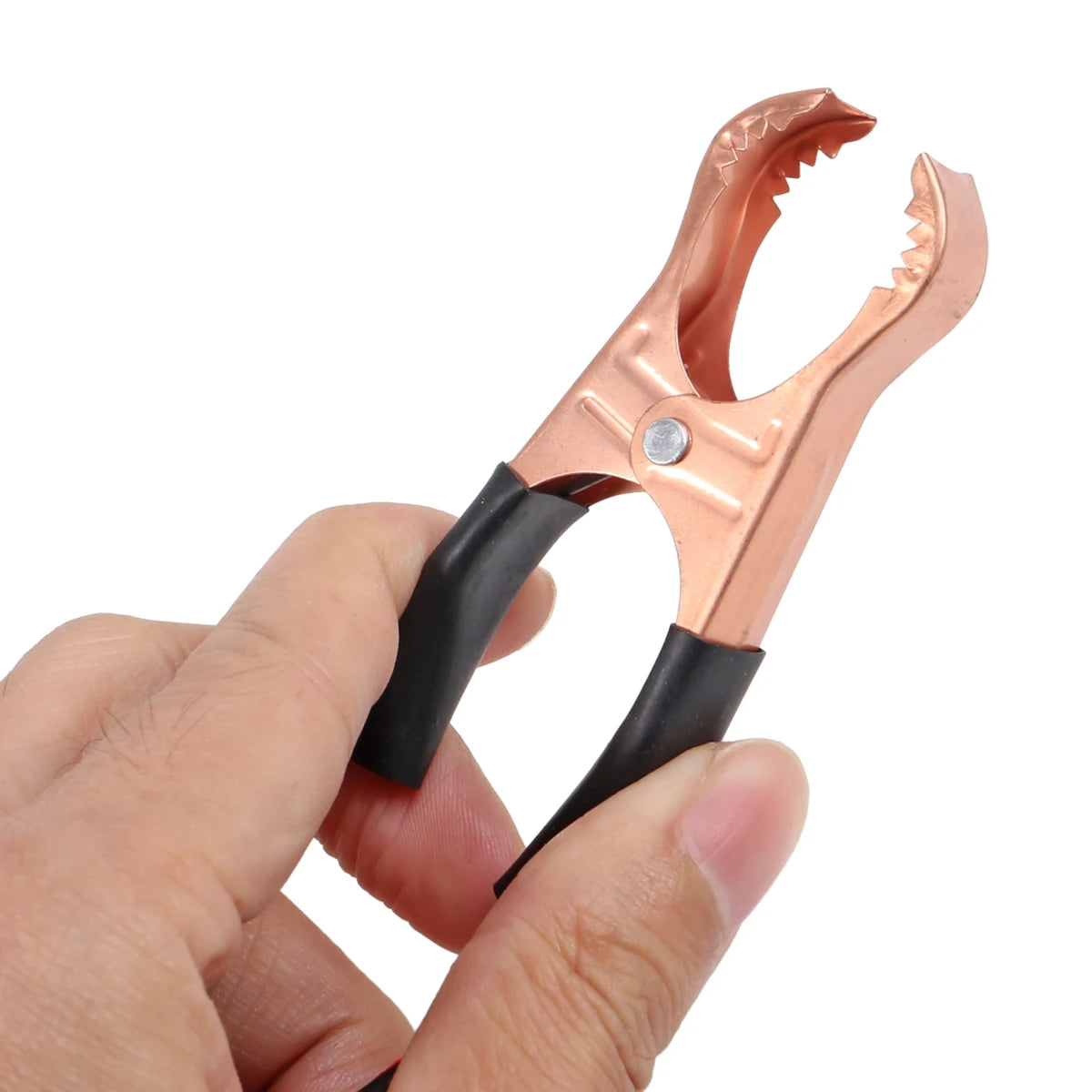 Close-up of a copper-coloured crocodile clip with insulated grip on the LED Battery and Alternator Tester lead
