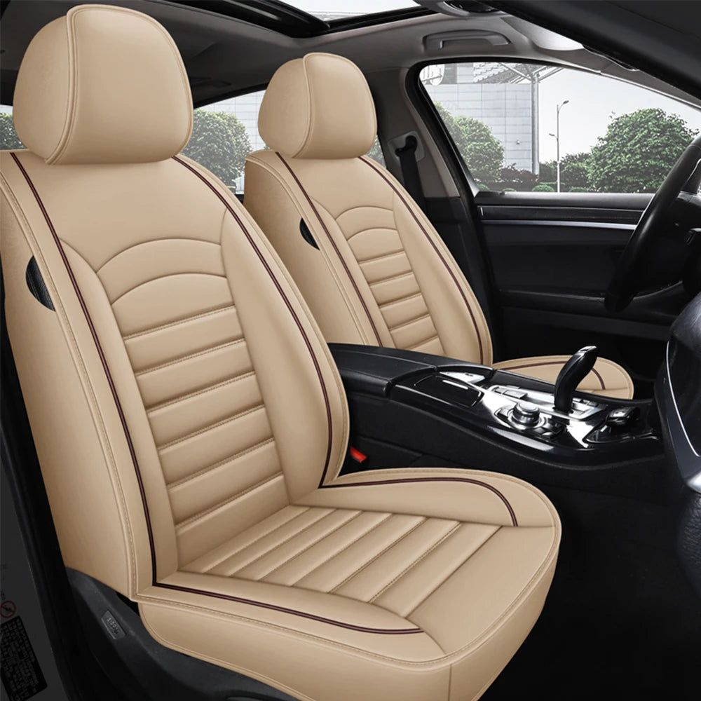 Beige Leather Car Seat Cover installed on car front seats with contrast piping viewed through open door