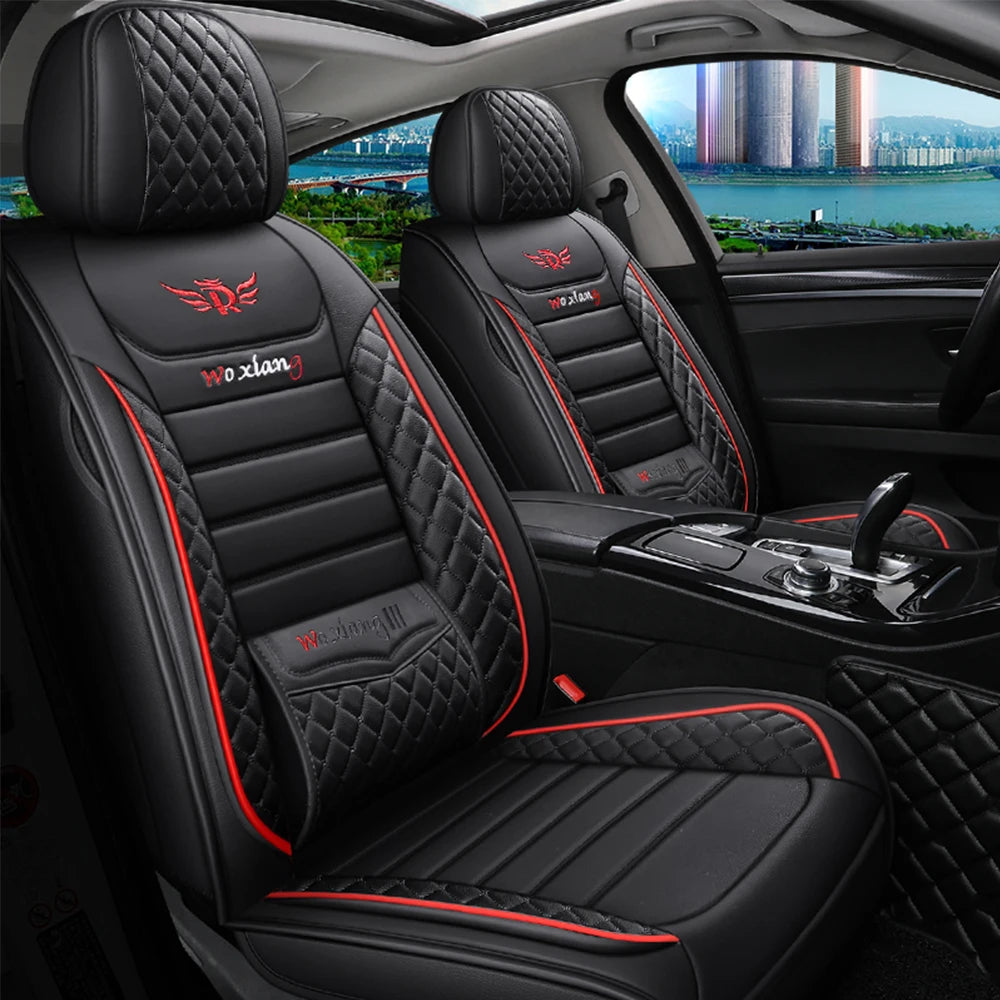 Black Diamond Quilted Leather Seat Covers installed on a sedan's front seats with red accent piping
