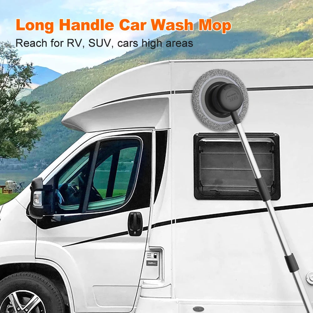 Electric Rotating Wash Mop with long handle extended to reach and clean the high roof area of an RV and SUV