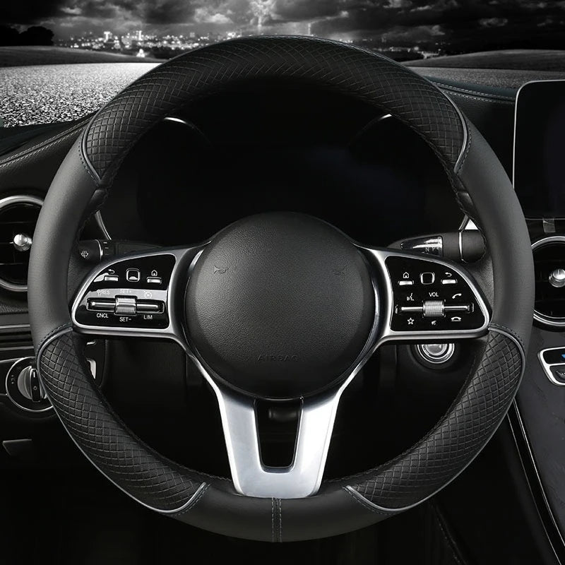 Diamond Leather Steering Wheel Cover in all-black leather, installed on a steering wheel