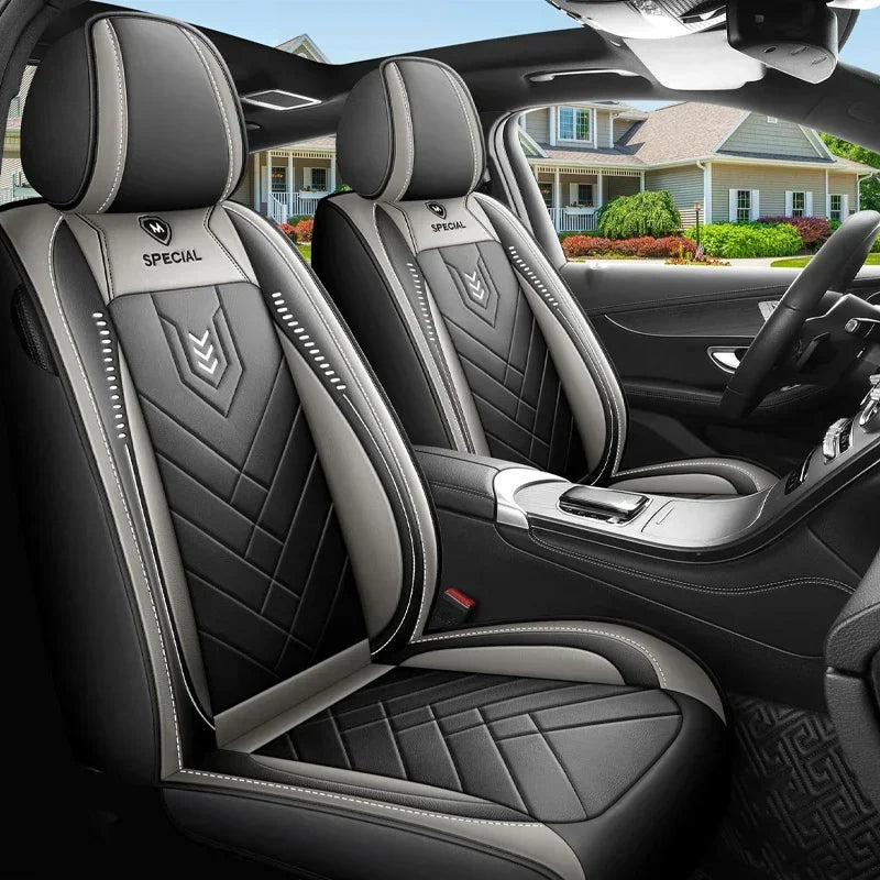 Black Leather-Look Front Pair Car Seat Covers shown from a different angle in a vehicle interior