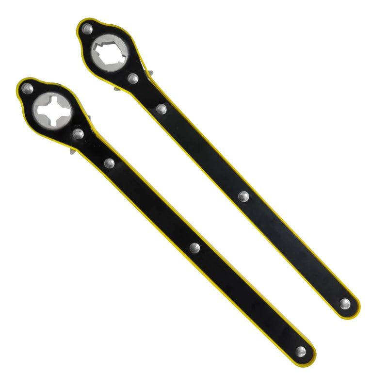 Pair of yellow and black ratchet wrenches for car scissor jacks on white background