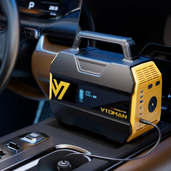 Compact 230Wh Power Station sitting on a car centre console, plugged into the vehicle 12V socket for in-car charging