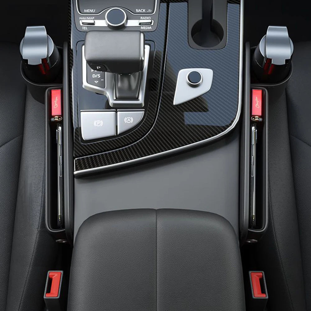 Overhead view of two leather seat gap organisers installed on both sides of the centre console in a car interior.