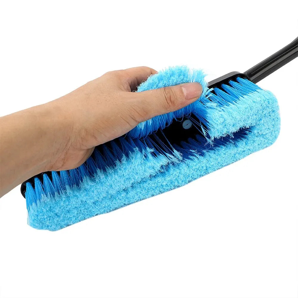 Macro close-up of a hand touching the soft blue bristles of the Car Foam Wash Brush head