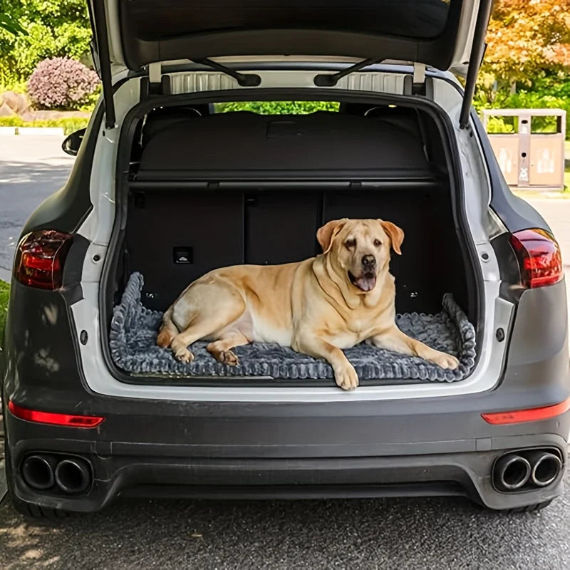 Grey Plush Pet Car Cushion fitted in an SUV cargo area with a yellow Labrador lying comfortably on the dog bed