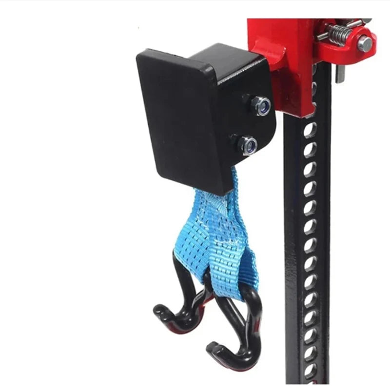 Close-up of the wheel lifter black mounting bracket fixed to a scissor jack lifting arm