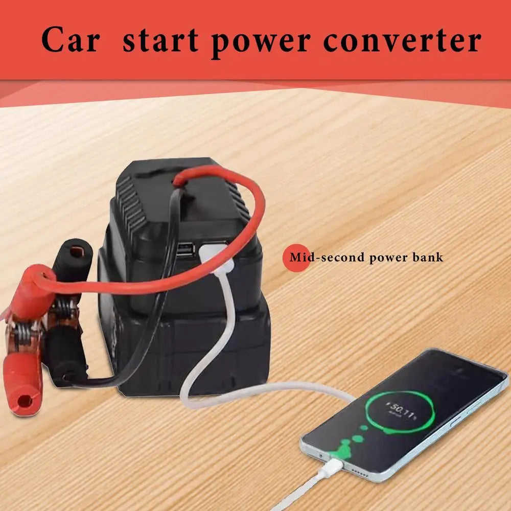 Tool Battery Jump Starter Adapter on a tool battery charging a smartphone via USB cable on a wooden table