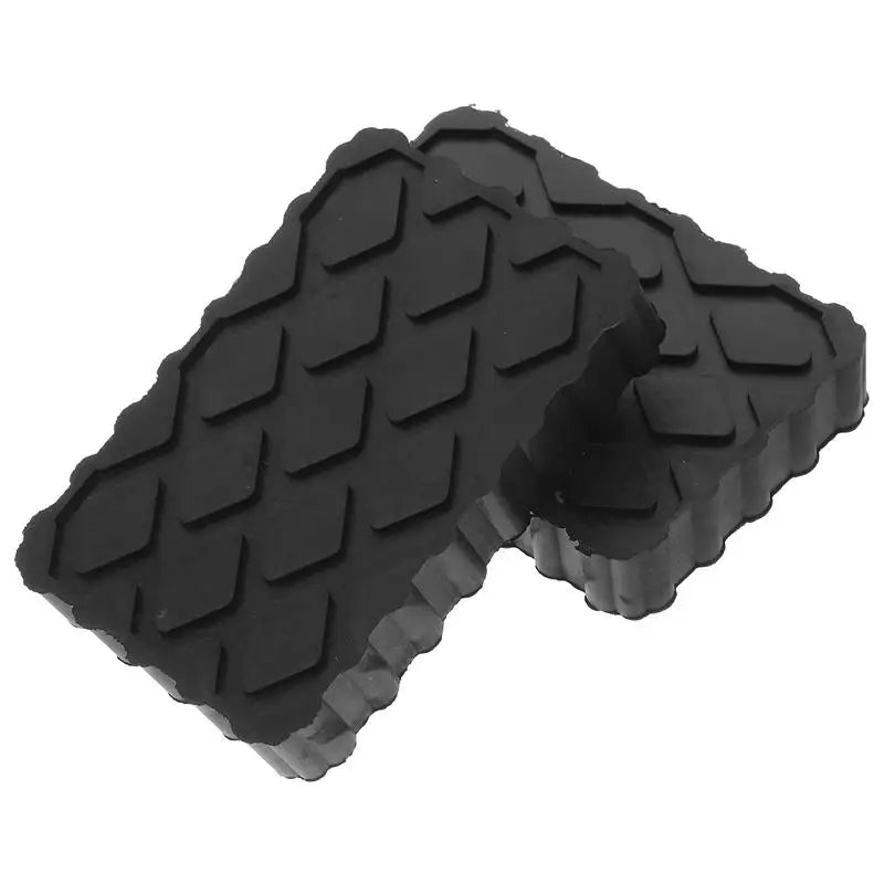 Two black rubber Heavy-Duty Jack Pads with anti-skid diamond tread stacked on a white background