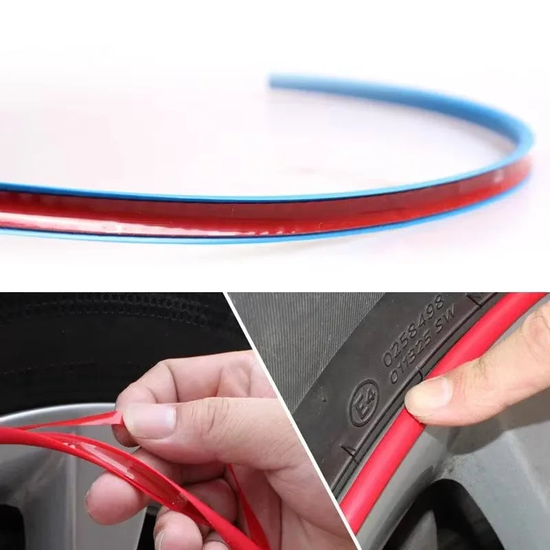 Close up of a two tone blue and red wheel rim protector strip clip alongside a hand fitting the strip into a tyre sidewall groove